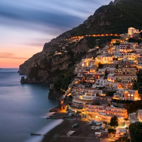 7-Day Amalfi Cruise & Rome Escape - Positano illuminated at night on the Amalfi Coast