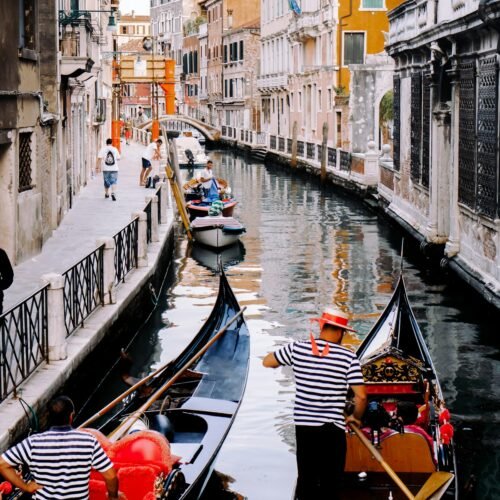 7-Day Rome, Florence & Venice Grand Tour - Gondolas moored in a Venice canal