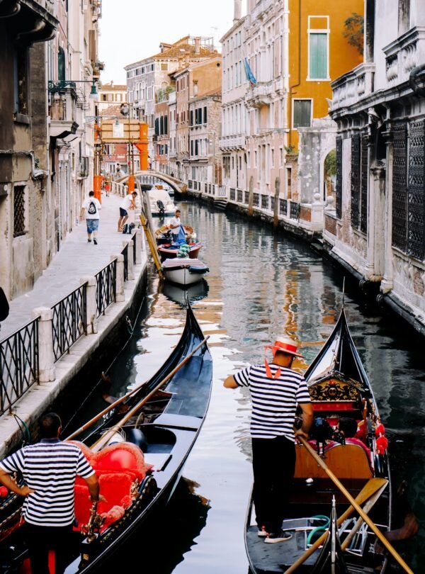 7-Day Rome, Florence & Venice Grand Tour - Gondolas moored in a Venice canal
