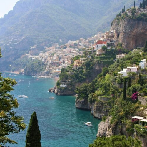 7-Day Amalfi Cruise & Rome Escape - Green coastal cliffs near the water