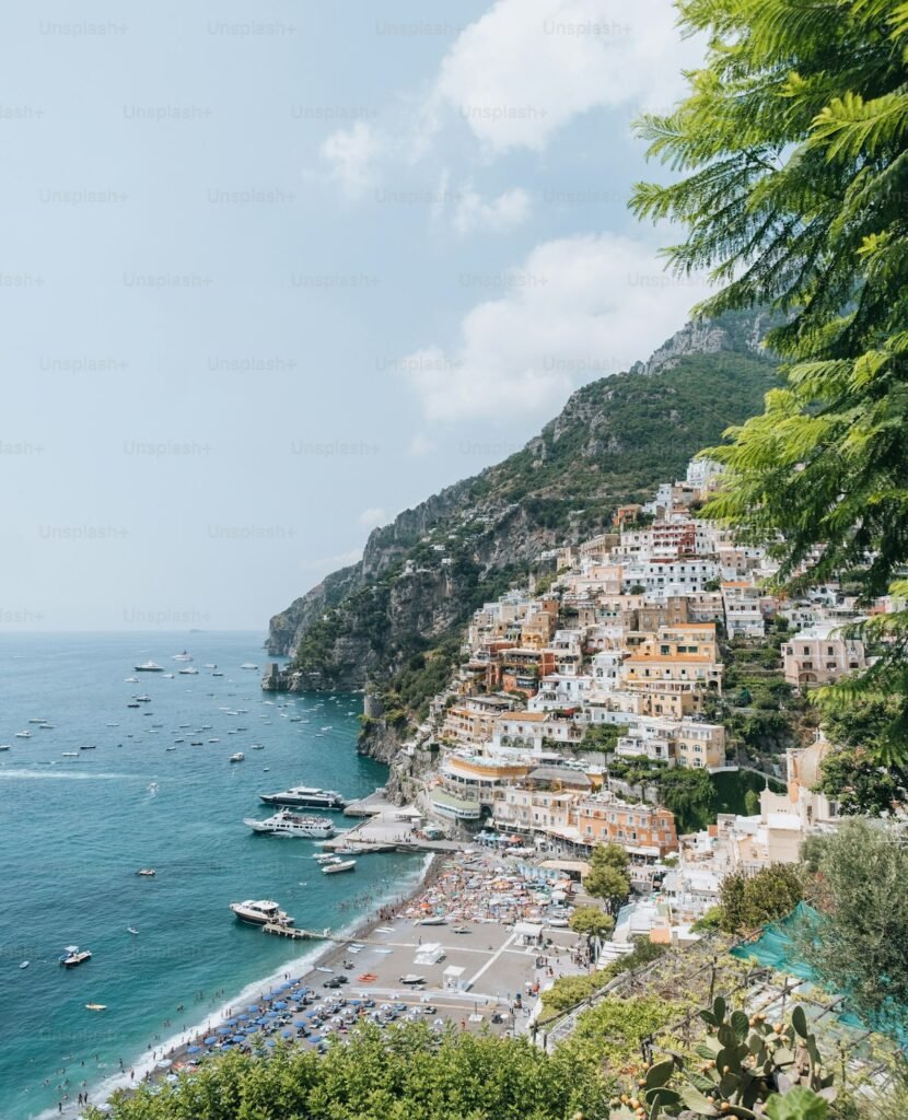 7-Day Amalfi Cruise & Rome Escape - Amalfi Coast beach with boats