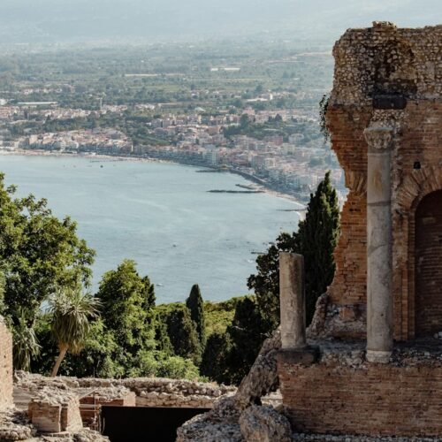 20-Day Grand Italy Cruise & Land Discovery - View of the sea from a historic building in Taormina