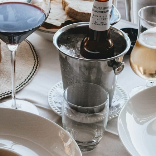 Private Chef Experience in a Roman Apartment - Dinner table with pasta and wine
