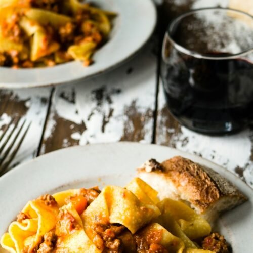 Private Chef Experience in a Roman Apartment - Plated pasta dish with wine