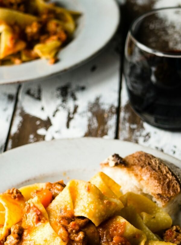 Private Chef Experience in a Roman Apartment - Plated pasta dish with wine