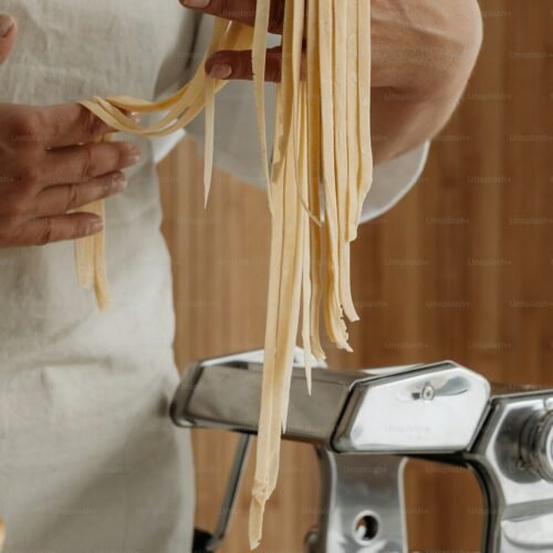 Pasta-Making Class with Local Chef - Chef holding handmade pasta