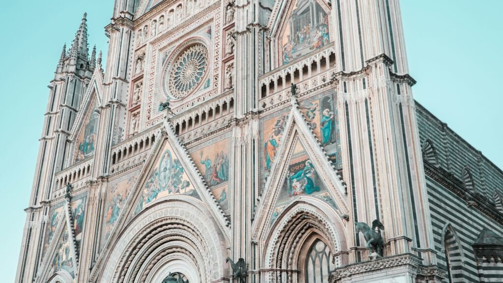 Orvieto & Umbria Hilltowns Experience - Stone building with clock tower in Orvieto