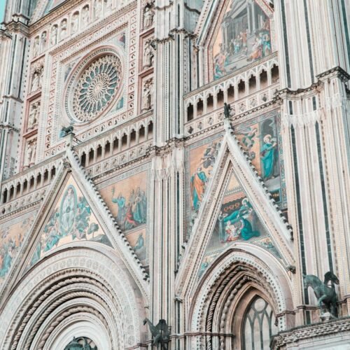 Orvieto & Umbria Hilltowns Experience - Stone building with clock tower in Orvieto