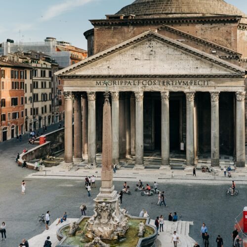 Pantheon & Historic Squares Tour - Visitors near a Rome piazza