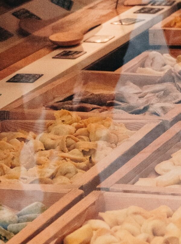 Authentic Roman Street Food Tour - Display case of Roman treats