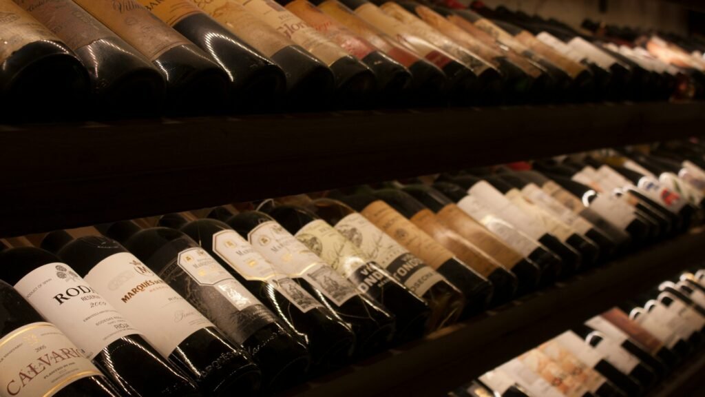 Food Tasting in a Historic Roman Cellar - Wine bottles on a cellar shelf
