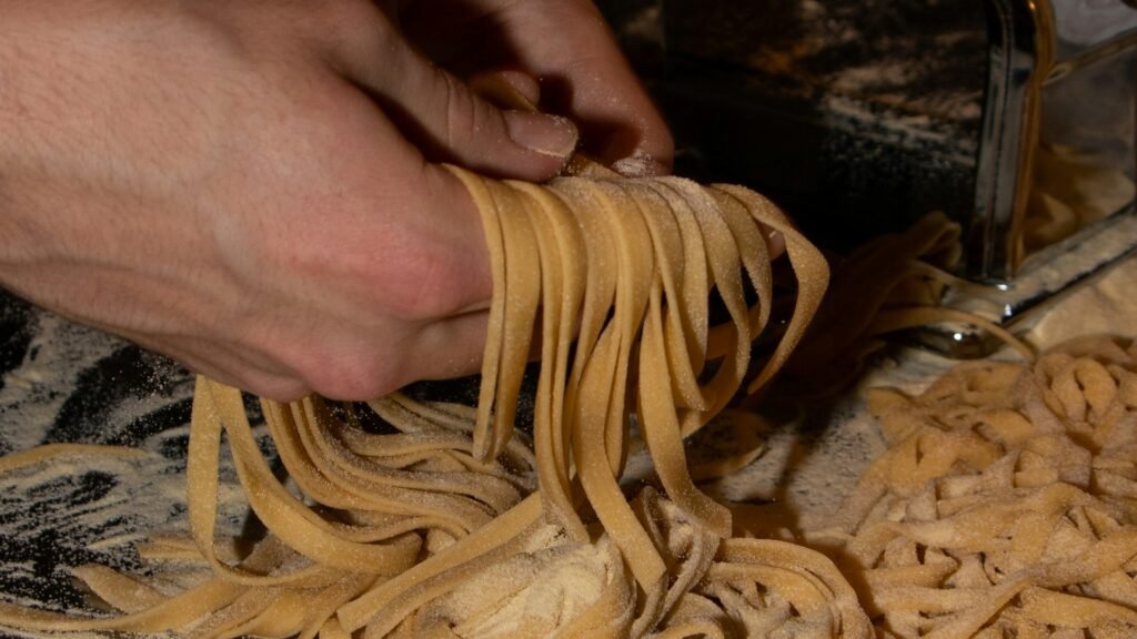 Pasta-Making Class with Local Chef - Making fresh pasta with a pasta machine