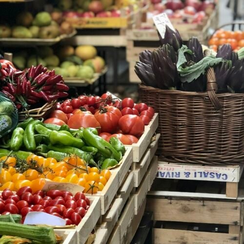 Morning Market Visit & Tasting Tour - Colorful market vegetables on display